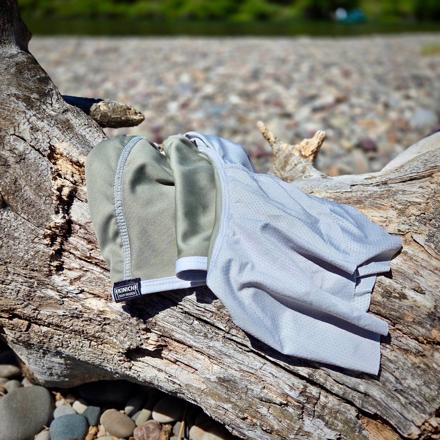Light Olive and Light Grey
hood displayed on a log.