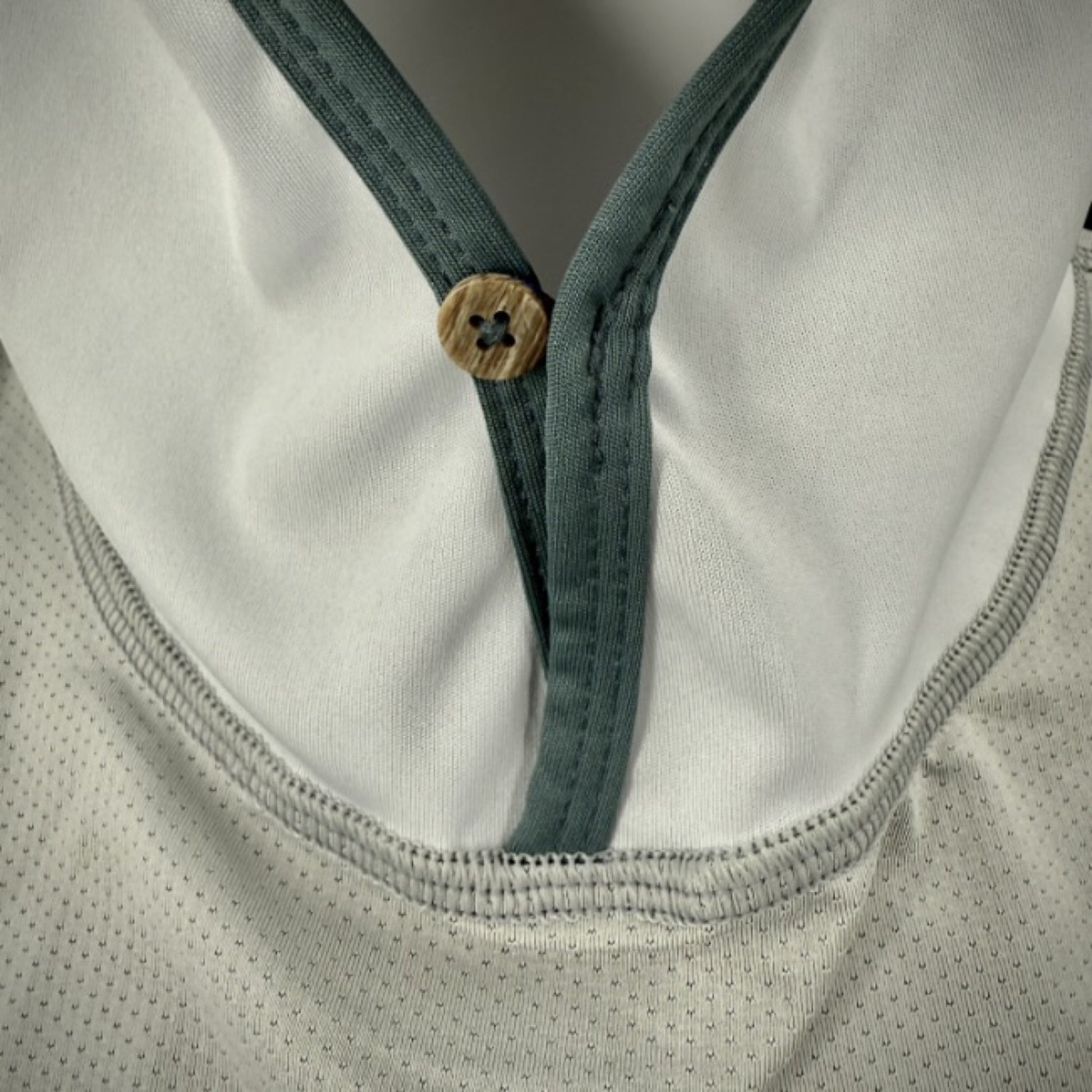 Kinich Sun Hoody close up on button closure